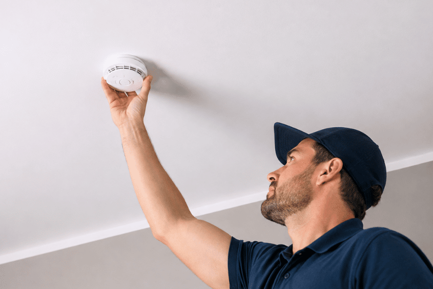 Can a Body Corporate Arrange or Pay for Smoke Alarm Compliance?